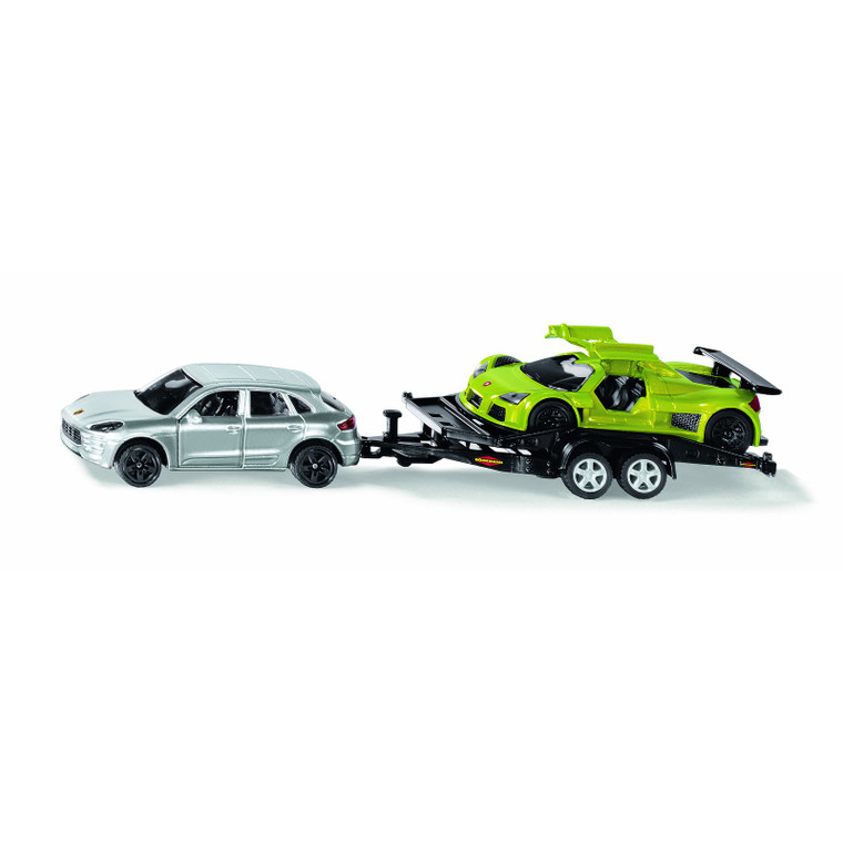 SIKU silver Porsche Macan SUV towing black trailer with two bright green racing cars, side view diecast toy set