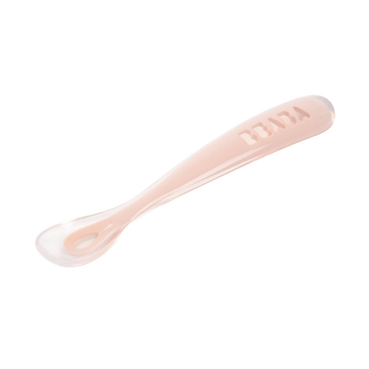 Beaba 1st stage silicone baby spoon in cotton candy pink, laid flat
