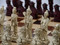 Berkeley Chess Mandarin (Red) Chessmen pieces (BC3005) white on board