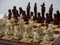 Berkeley Chess Mandarin (Red) Chessmen pieces (BC3005) both on board