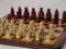 Berkeley Chess Isle of Lewis (Red) Chessmen pieces (BC3001) shown on board