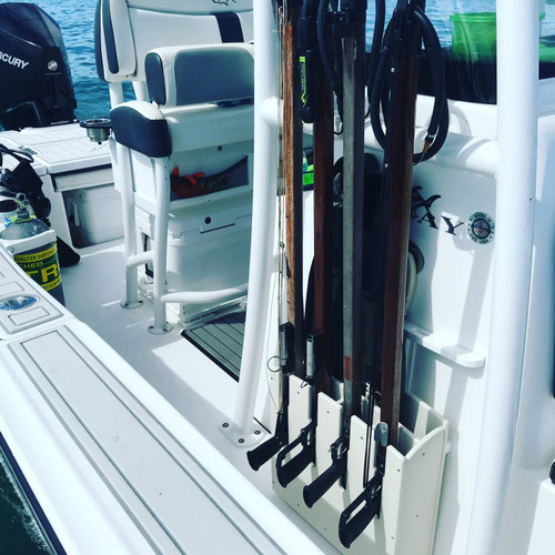 4 Speargun Rack with Fin Holder, mounted on side of console.   Spearguns are for display only and not included with speargun racks. 