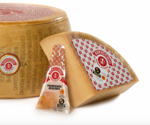 The marked wheels of Parmigiano-Reggiano (Parmesan) cheese