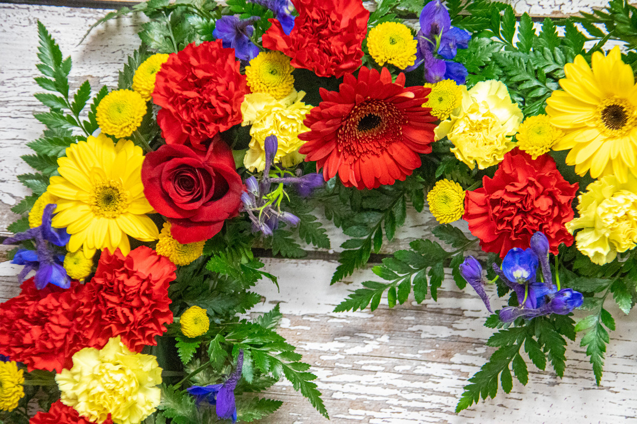 All The Bright Colors Heart Shaped Tribute Wreath