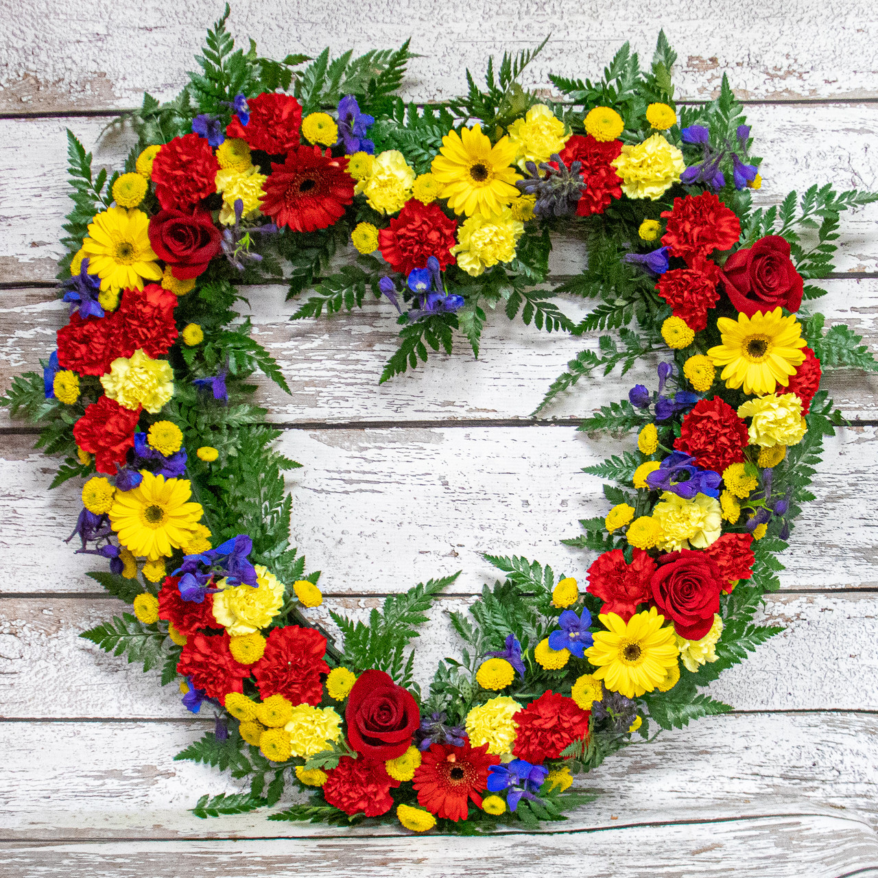 All The Bright Colors Heart Shaped Tribute Wreath