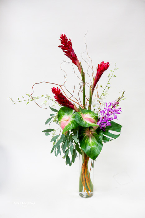 A Tropical Rose Vase Arrangement Loveland Flower Delivery Earle s