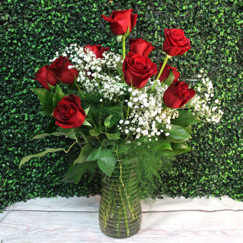 Traditional red rose arrangement in a vase
