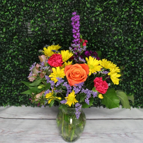 Bright spring flower arrangement in a vase