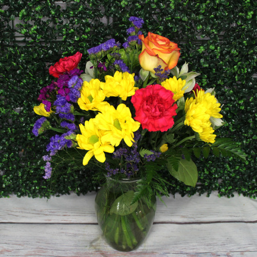 Another example of the Vibrant Spring arrangement of bright spring flowers in a vase