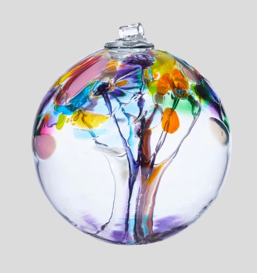 “The Tree of Joy reminds us that when we use our gifts and talents to be our truest self, we cultivate joy within ourselves.” The Tree of Enchantment Collection is Kitras Art Glass’ signature creation. Like trees in a forest, no two are alike. With glass “leaves” cascading across the top of the orb and “trunk” webbing pulled through the interior from bottom to top, the Tree of Enchantment is a magnificent, eye catching piece in any size.