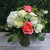 Hydrangea and roses arranged in a vase