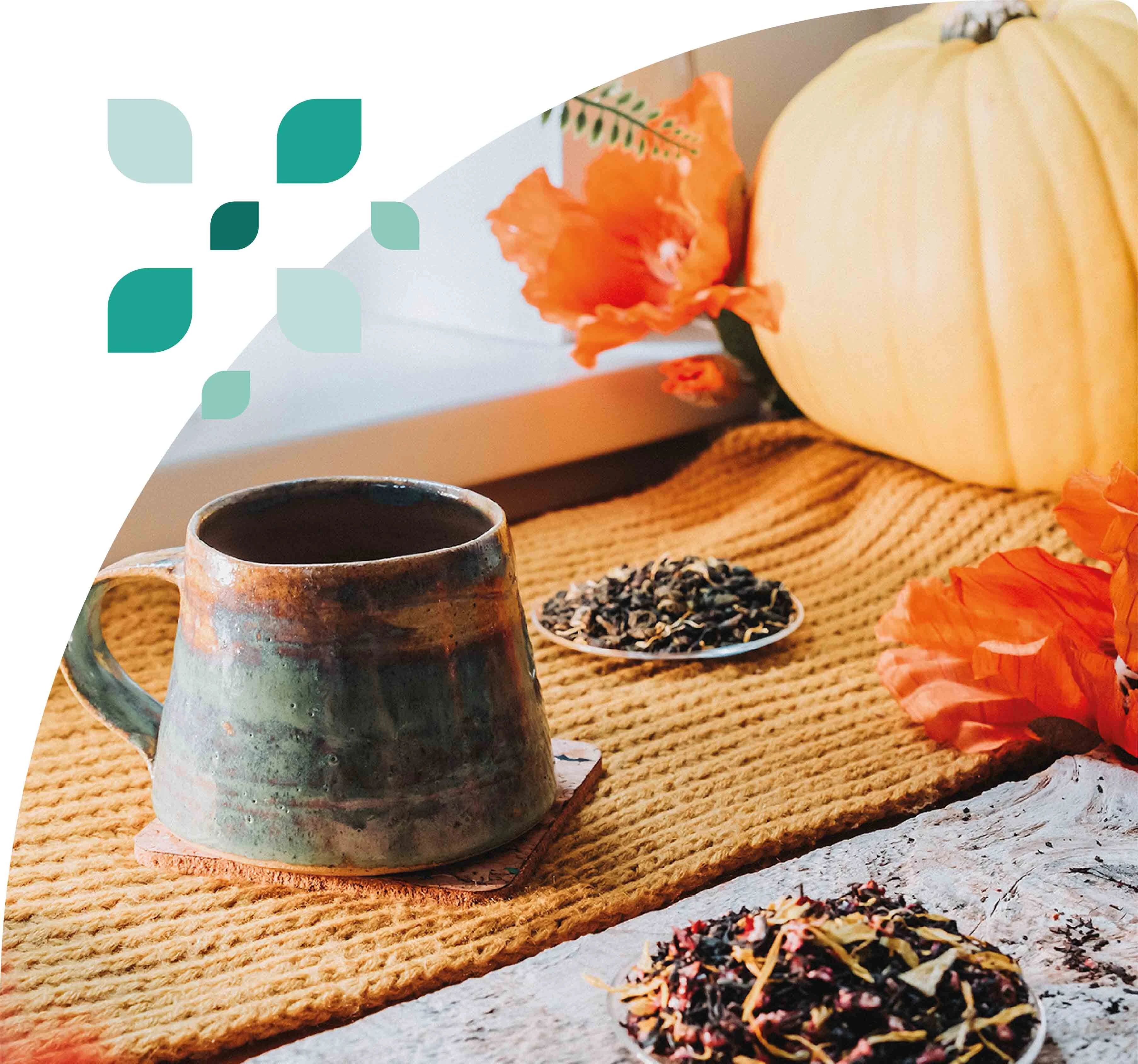 A beautifully presented glass cup of premium wholesale chamomile tea flowers from Jenier.