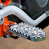 MACHINE FINISH BDCW Platform Footpeg for big BMW adventure bikes. Available in standard or lowered heights, as well as anodized black or orange finishes.