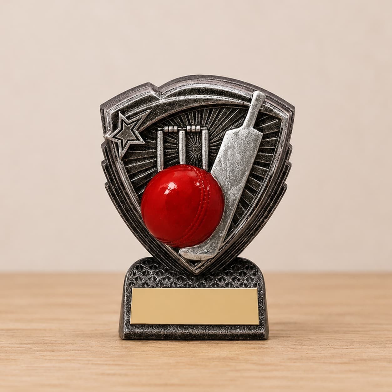Utopia Mini cricket award with red cricket ball, bat, stumps and personalised engraved plate