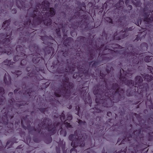 Lumin Fabrics Island Batik Springtime Bouquet Batiks Flowers and Leaves Purple Wisteria, fabric with a floral and leaf pattern in various shades of purple.