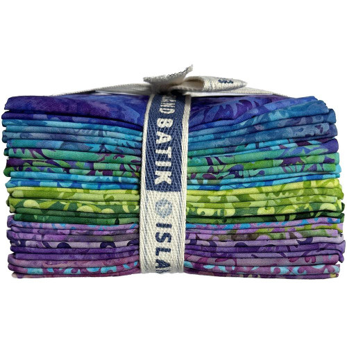 Lumin Fabrics Island Batik Springtime Bouquet Batiks Fat Quarter Bundles, a neatly stacked collection of colorful batik fabrics in purple, blue, green, and violet hues tied with a white and blue ribbon.