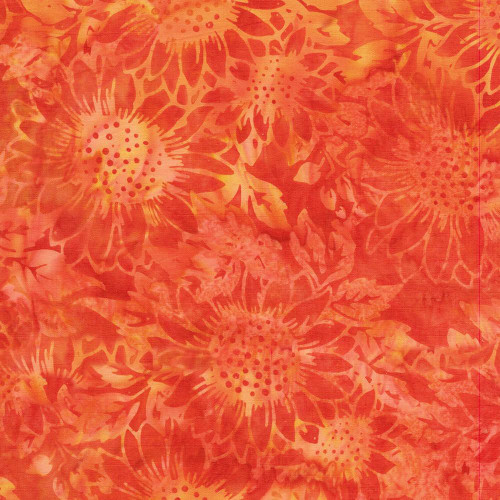 Lumin Fabrics Island Batik Sunflower Spice Batiks Large Sunflowers Orange Vermillion, vibrant batik fabric with large sunflower patterns in shades of orange, yellow, and red.