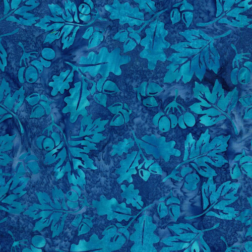 Lumin Fabrics Island Batik Sunflower Spice Batiks Acorns and Leaves Blue Shark, blue batik fabric with sunflower, acorns, and leaf patterns in shades of blue.