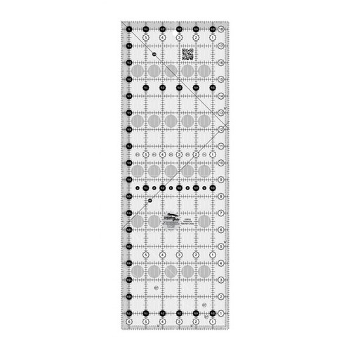 This 6-1/2 inch x 18-1/2 inch rectangle ruler features easy-to-read black and white markings printed in 1 inch grids marked in 1/8 inch and 1/4 inch increments.