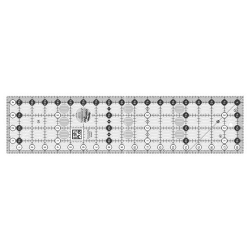 This 4-1/2 inch x 18-1/2 inch rectangle ruler features easy-to-read black and white markings printed in 1 inch grids marked in 1/8 inch and 1/4 inch increments.