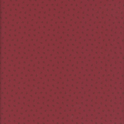 Marcus Fabrics Arabella Carrie Quinn Red Tiny Tri-Leaf, a red fabric with a small black leaf pattern.