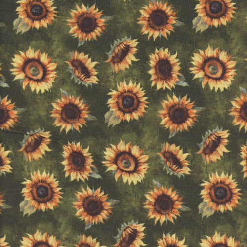 Wilmington Prints Sunkissed Nancy Mink Green Yellow Tossed Sunflowers, fabric featuring a pattern of yellow and orange sunflowers with green leaves on a green background.