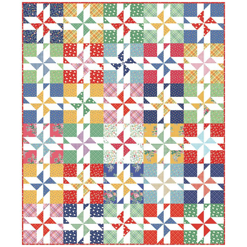 Riley Blake Fabrics Simple Pleasures American Jane Skip a Beat Quilt Kit, colorful patchwork quilt with pinwheel patterns in red, green, blue, yellow, pink, and white, with various floral and plaid fabric designs, edged with a red border.