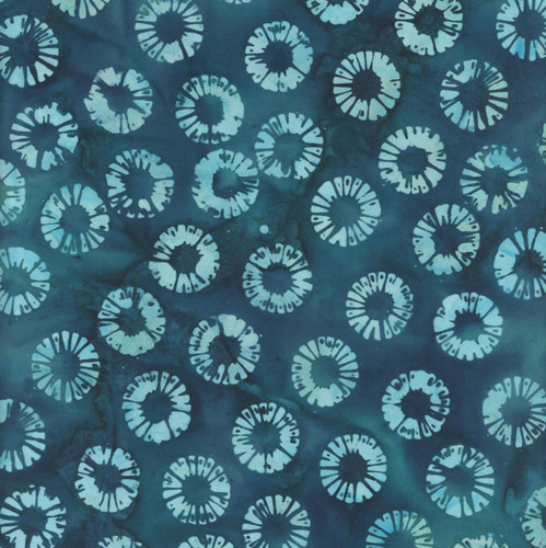 Windham Fabrics Anthology Batiks Jacqueline de Jonge Luna Teal Blue Petal Wheels fabric, teal background with white petal wheel patterns.