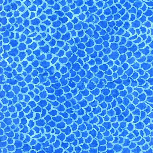 Timeless Treasures Fabrics Tonga Batiks Happy Blue Fish Scales, vibrant blue fabric with a fish scale pattern in light and dark shades of blue.