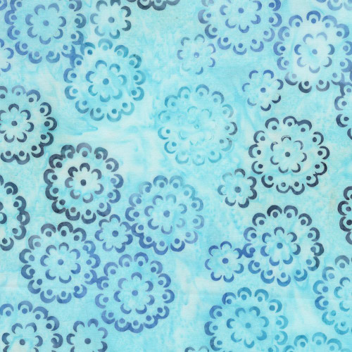 Windham Fabrics Anthology Batiks Jacqueline de Jonge Beach Day Blue Gardenias, blue background with floral batik pattern.