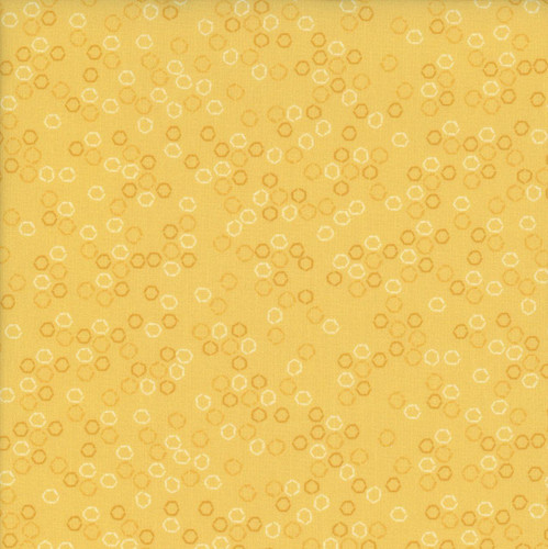 Dear Stella Fabrics Sting Like a Bee Gold Yellow Honeycomb, fabric with a honeycomb pattern in gold and white colors.