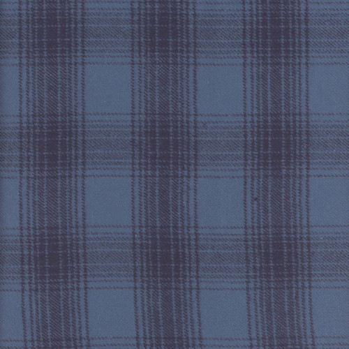 Marcus Fabrics Cool Blues Primo Plaid Flannel Denim Blue Windowpane Plaid, close-up of blue plaid flannel fabric featuring a classic windowpane pattern in shades of denim blue and dark navy.