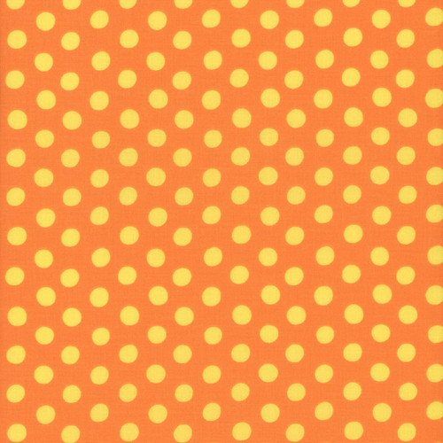 Kaffe Fassett Collective for FreeSpirit Fabrics February 2026 by Kaffe Fassett Spot Mango, vibrant orange fabric with yellow polka dots.