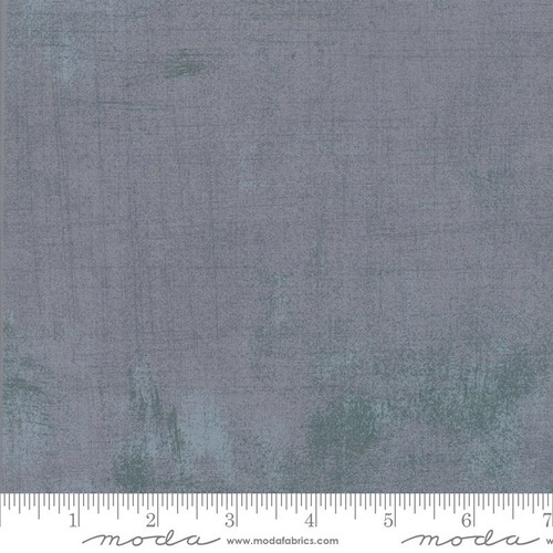Moda Grunge Texture has a distinct layered effect that creates a modern background that goes with just about anything. The range of colors are the perfect compliment to this unique textured solid. Printed on 108 inch cotton.