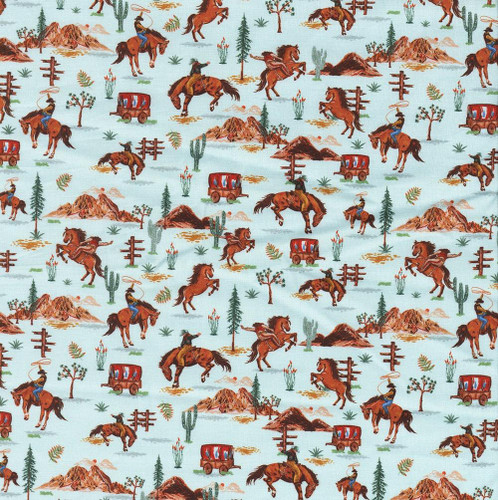 In The Beginning Fabrics Southwest Minis by Jason Yenter, featuring cowboy and horse illustrations with wagons, cacti, mountains, and desert scenery on a light background.