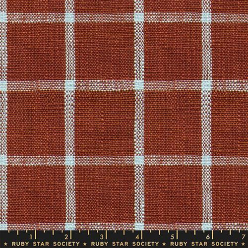 Moda Ruby Star Society Fabrics 16 inch Sunshine Toweling Window Plaid Cayenne Brown, close-up of orange and white checkered plaid fabric with light blue accents. Moda Ruby Star Society Fabrics 16 inch Sunshine Toweling Window Plaid Cayenne Brown, close-up of orange and white checkered plaid fabric with light blue accents.