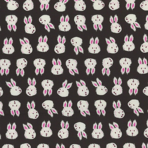 Moda Ruby Star Society Fabrics Hello Alice Sarah Watts Rushing Rabbit Black fabric, featuring a pattern of white rabbits with pink accents on a black background.