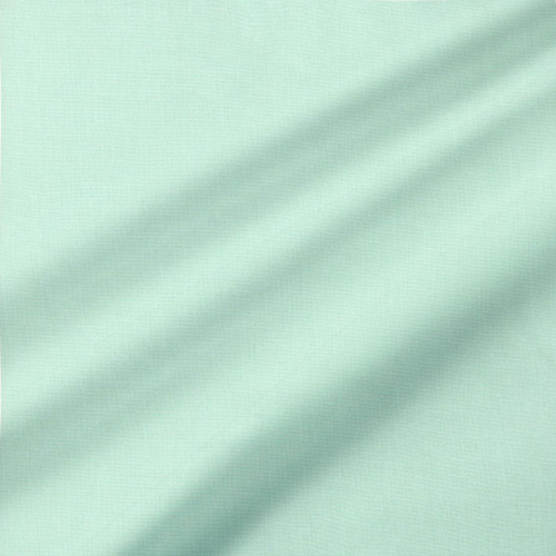 Free Spirit Fabrics Designer Essential Solids Unicorn Poop by Tula Pink Whimsy, light mint green solid fabric with a smooth texture.