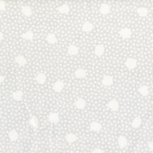 Studio E Fabrics Joann Fabrics Double Dot White On White, close-up of white fabric with small white polka dots pattern.