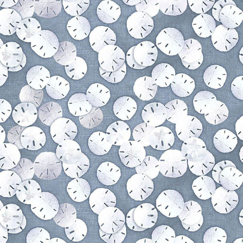Timeless Treasures Fabrics Let Your Light Shine Sand Dollars Blue fabric with a pattern of white sand dollar shells on blue background.