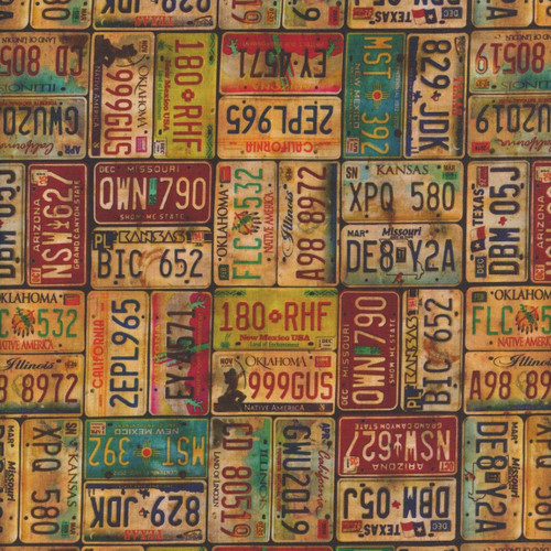 Blank Quilting Fabrics Historic Highway Thea Leaney Multi Vintage License Plates, close-up of colorful vintage license plate patterns on fabric.