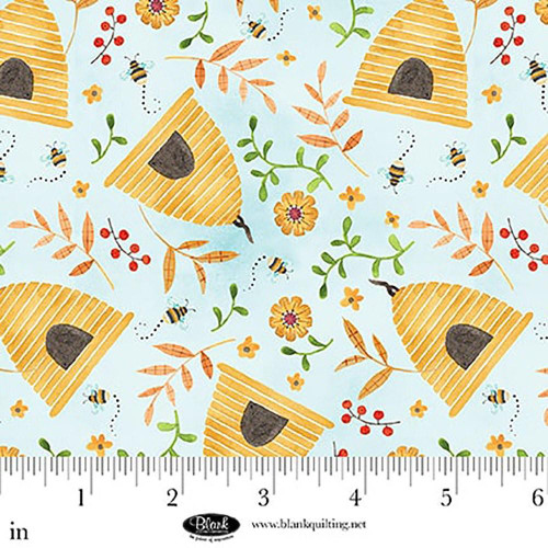 Blank Quilting Fabrics Nature's Symphony Color Pop Studio Light Blue Beehives and Leaves, fabric design with beehives, bees, flowers, and leaves on a light blue background.