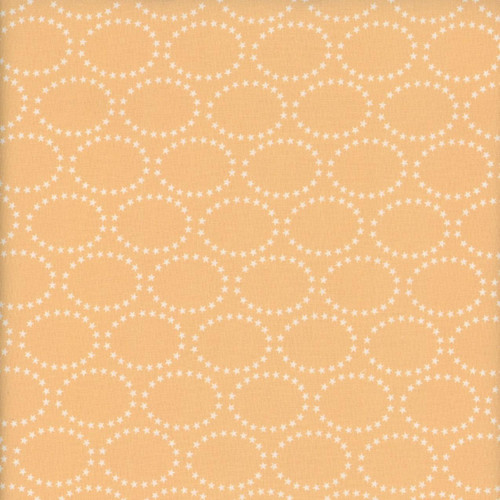 Blank Quilting Fabrics The Bright Side Jessica Dayon Peach Pink Star Ovals, fabric with peach background and white star oval pattern.