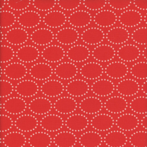 Blank Quilting Fabrics The Bright Side Jessica Dayon Red Star Ovals, fabric featuring white star oval patterns on a red background.