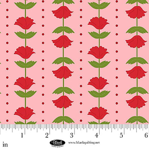 Blank Quilting Fabrics The Bright Side Jessica Dayon Light Pink Flower and Polka Dot Stripe, fabric with red flowers, green leaves, and polka dots on a pink background.