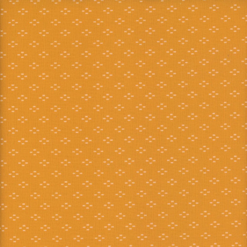 Blank Quilting Fabrics The Bright Side Jessica Dayon Orange Dash Diamonds, orange fabric with a white dashed diamond pattern.