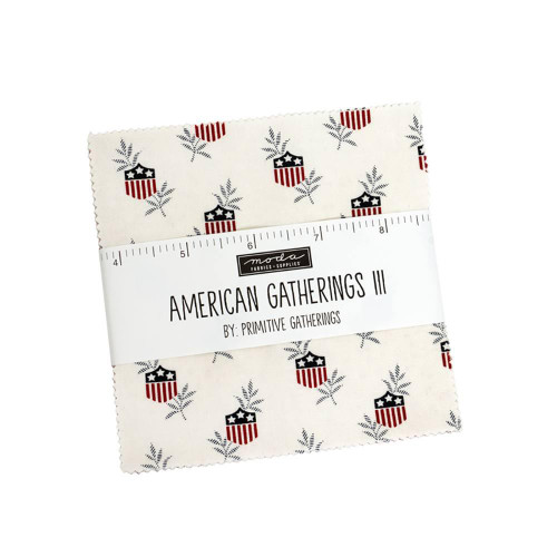 Moda Fabrics American Gatherings Primitive Gatherings Charm Pack Five Inch Squares, fabric pack with patriotic red, white, and black shield and star patterns on a white background.