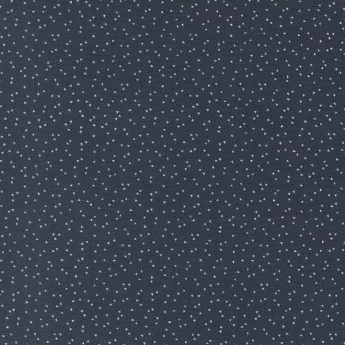 Moda Fabrics American Gatherings Primitive Gatherings Americana Confetti Navy Blue, navy blue fabric with small white confetti-like triangle patterns.