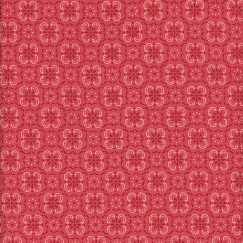 Riley Blake Fabrics Farmer's Daughter by Lori Holt Bandana Tea Rose Pink, fabric with a pink background and a repetitive floral pattern in darker and lighter pink tones.