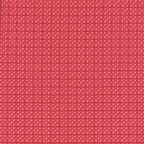 Riley Blake Fabrics Farmer's Daughter by Lori Holt Weave Cherry Tart Red, close-up of a red woven fabric with a detailed crosshatch pattern.